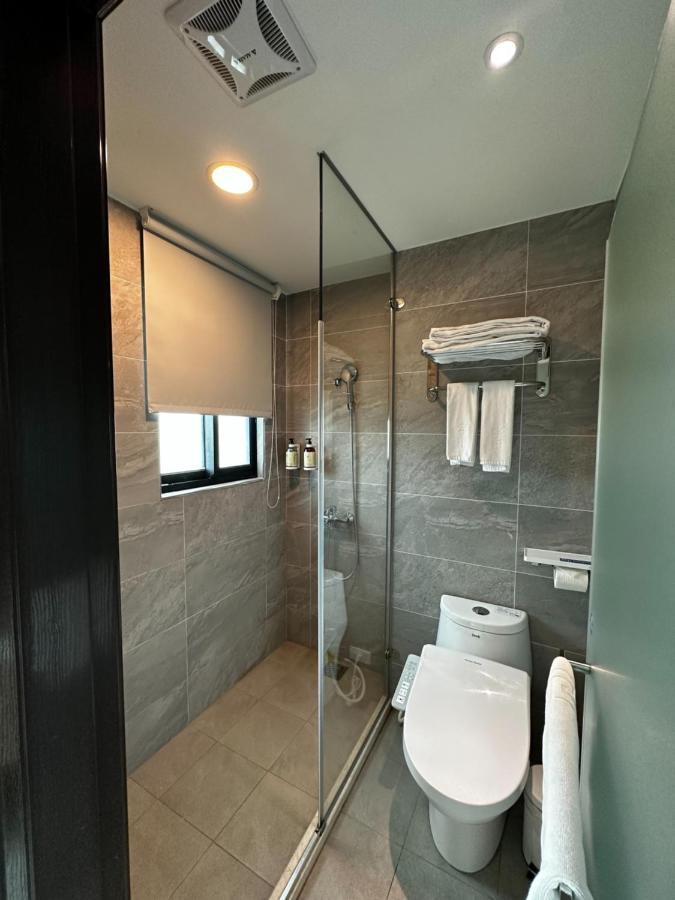 E Hotel Xinshi Bagian luar foto