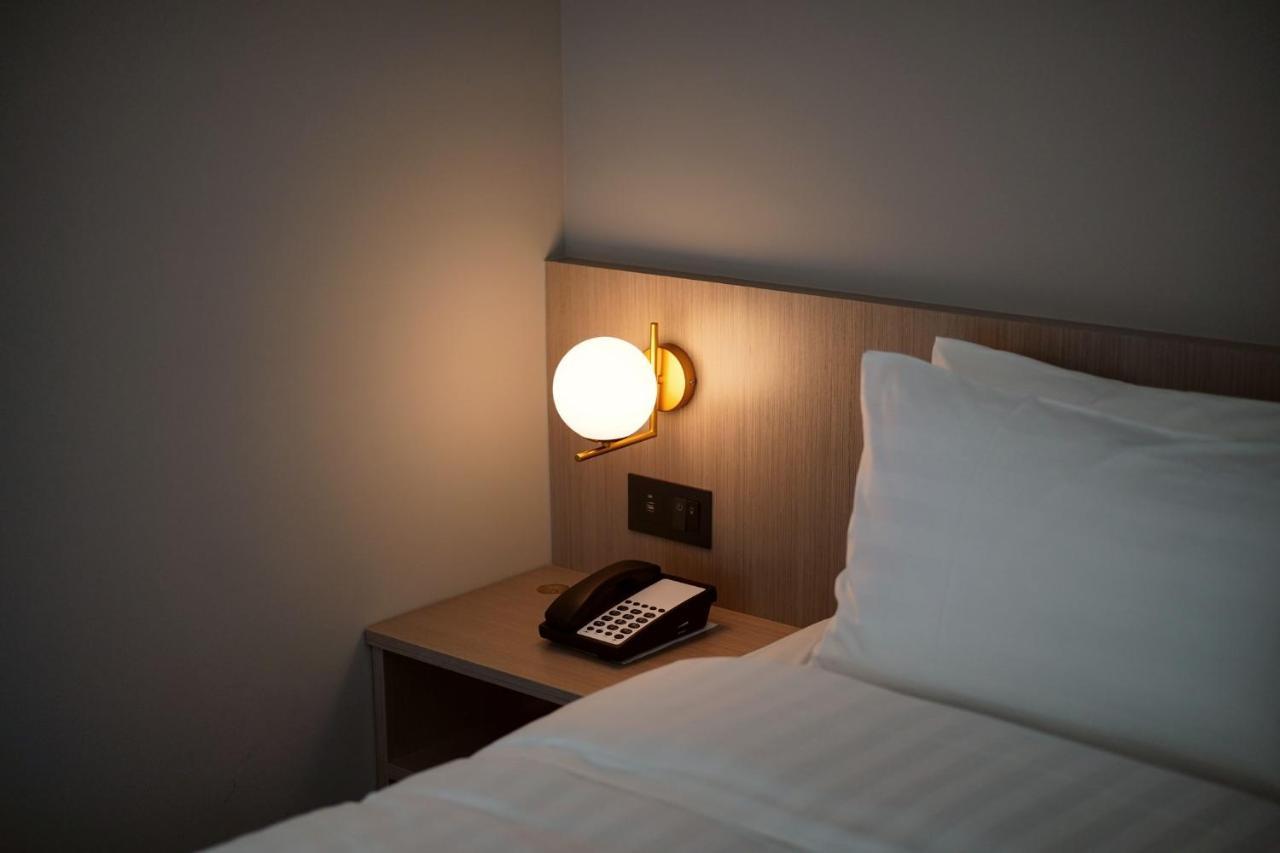 E Hotel Xinshi Bagian luar foto