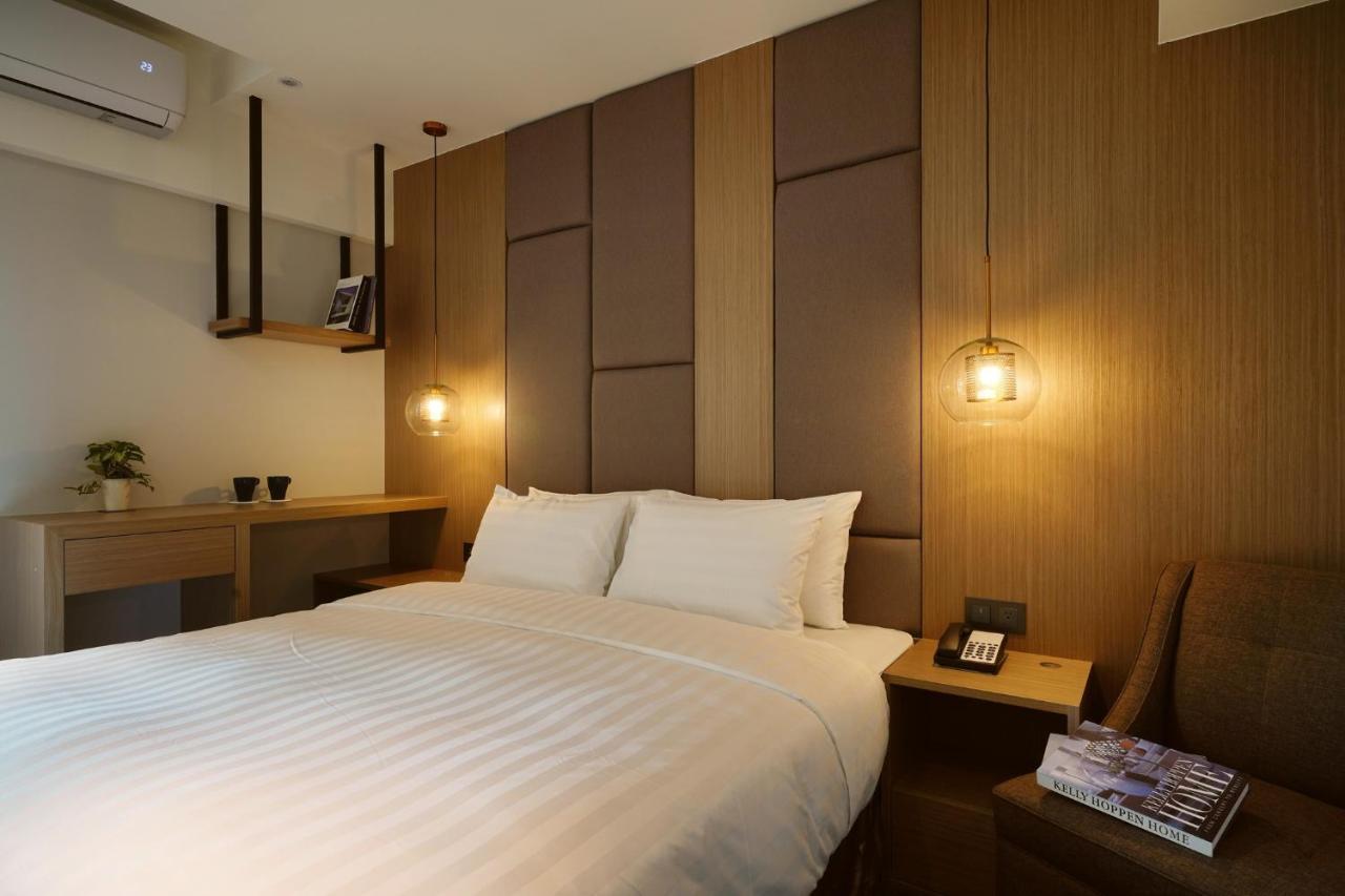 E Hotel Xinshi Bagian luar foto