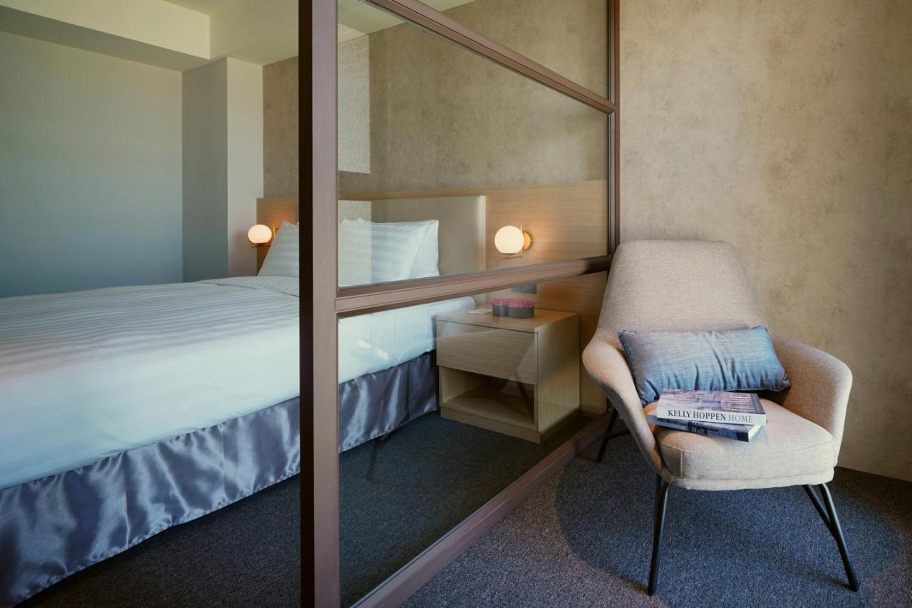 E Hotel Xinshi Bagian luar foto
