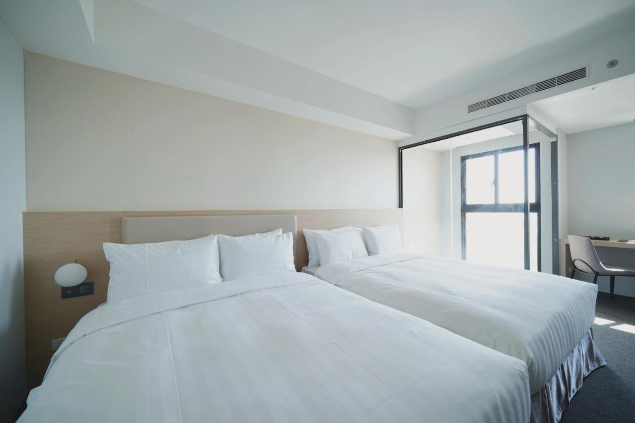 E Hotel Xinshi Bagian luar foto