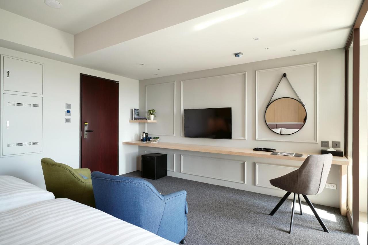 E Hotel Xinshi Bagian luar foto