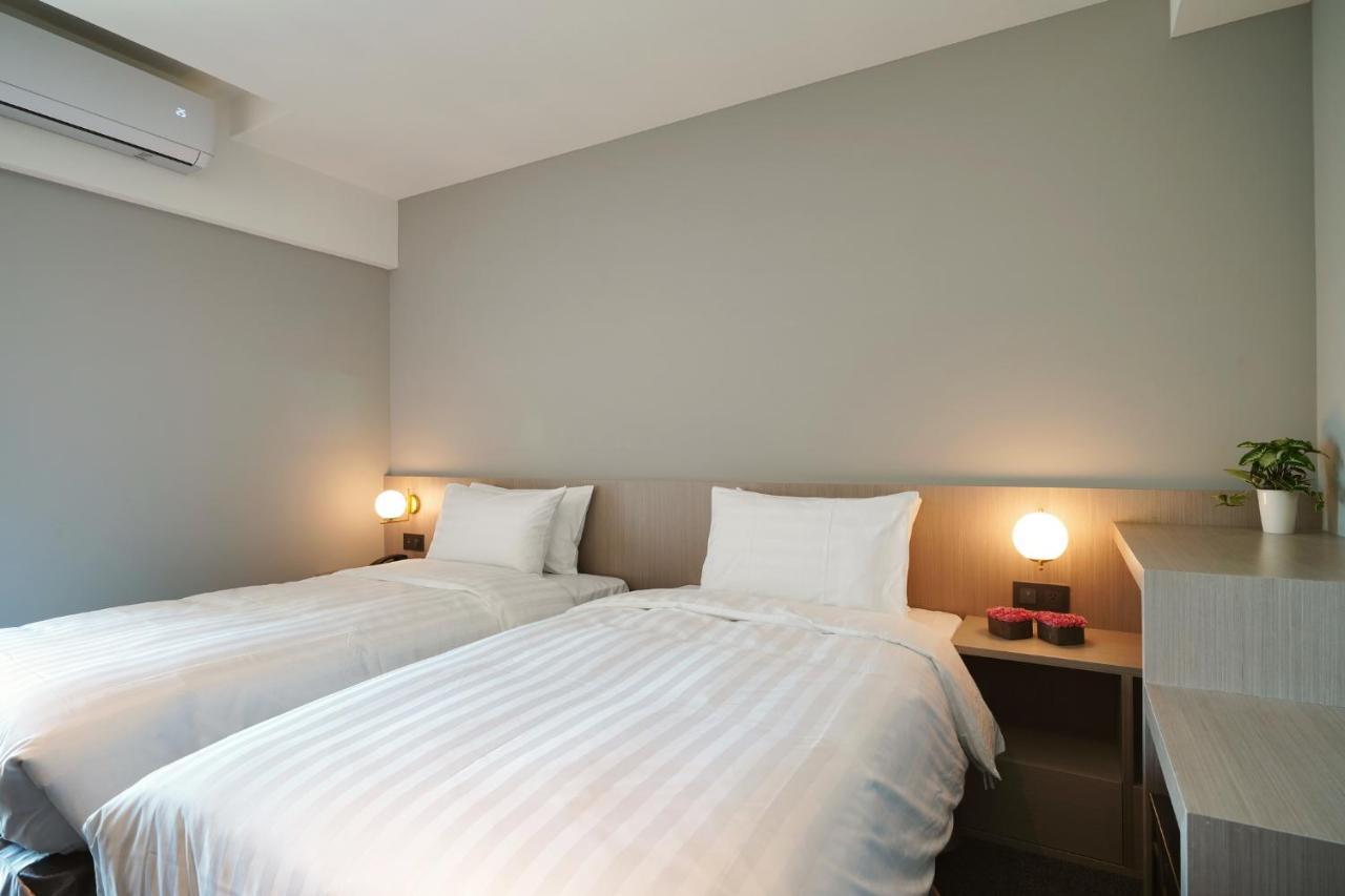 E Hotel Xinshi Bagian luar foto